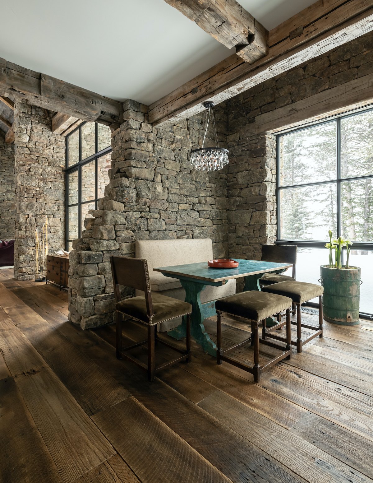 Big Sky Journal’s winter issue features this JLF Architects-designed Jackson Hole house, praising the history-inspired stone “remnant” wall that divides and warms the space (PC: Audrey Hall).