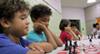 Students in the new documentary "Building Minds with Chess," featuring Grandmaster Pontus Carlsson