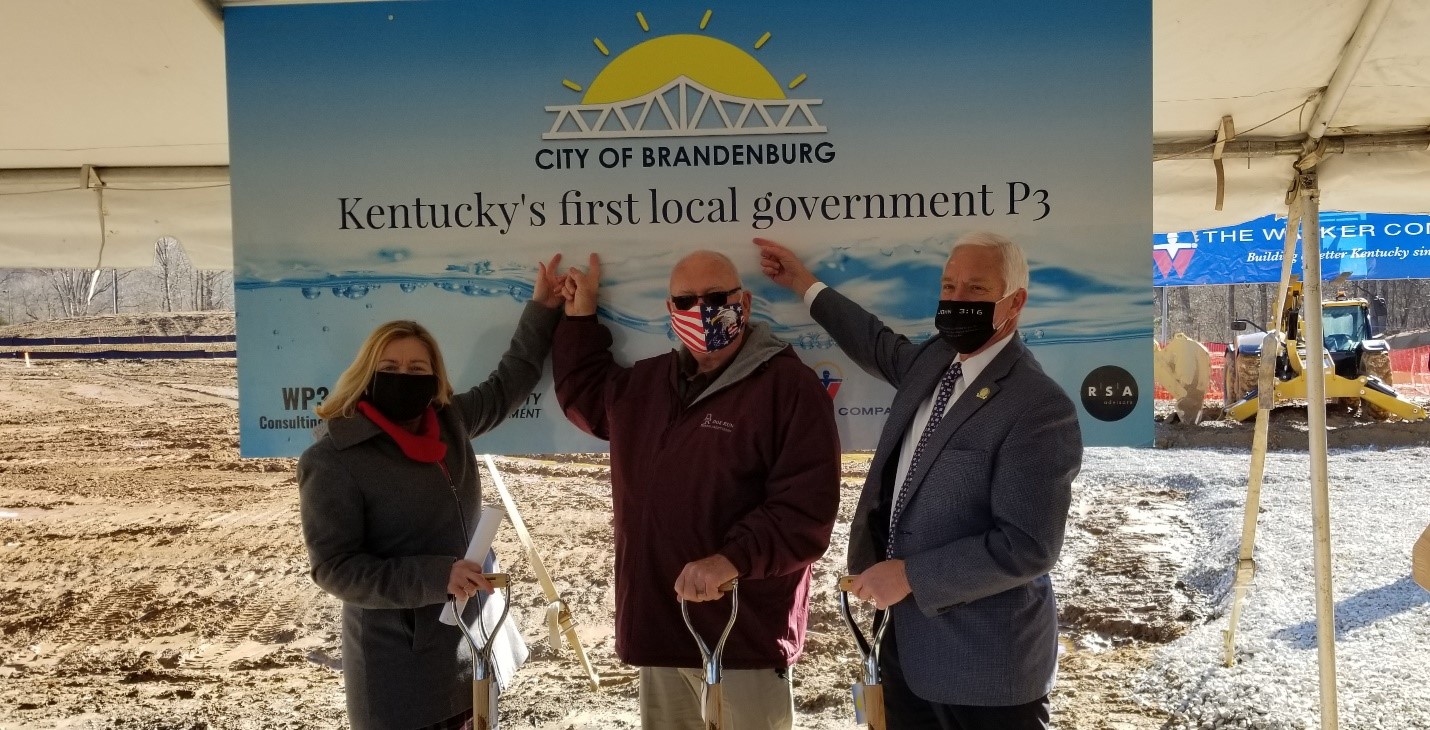 Representative Nancy Tate, Brandenburg Mayor Ronnie Joyner, and Senator Stephen Meredith celebrate having the first local P3 project in the state, which HB309 enabled.
