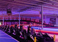 the elevated go kart track at K1 Speed Oxford lit by LED lights