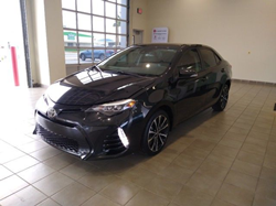 2017 Toyota Corolla parked at a dealership