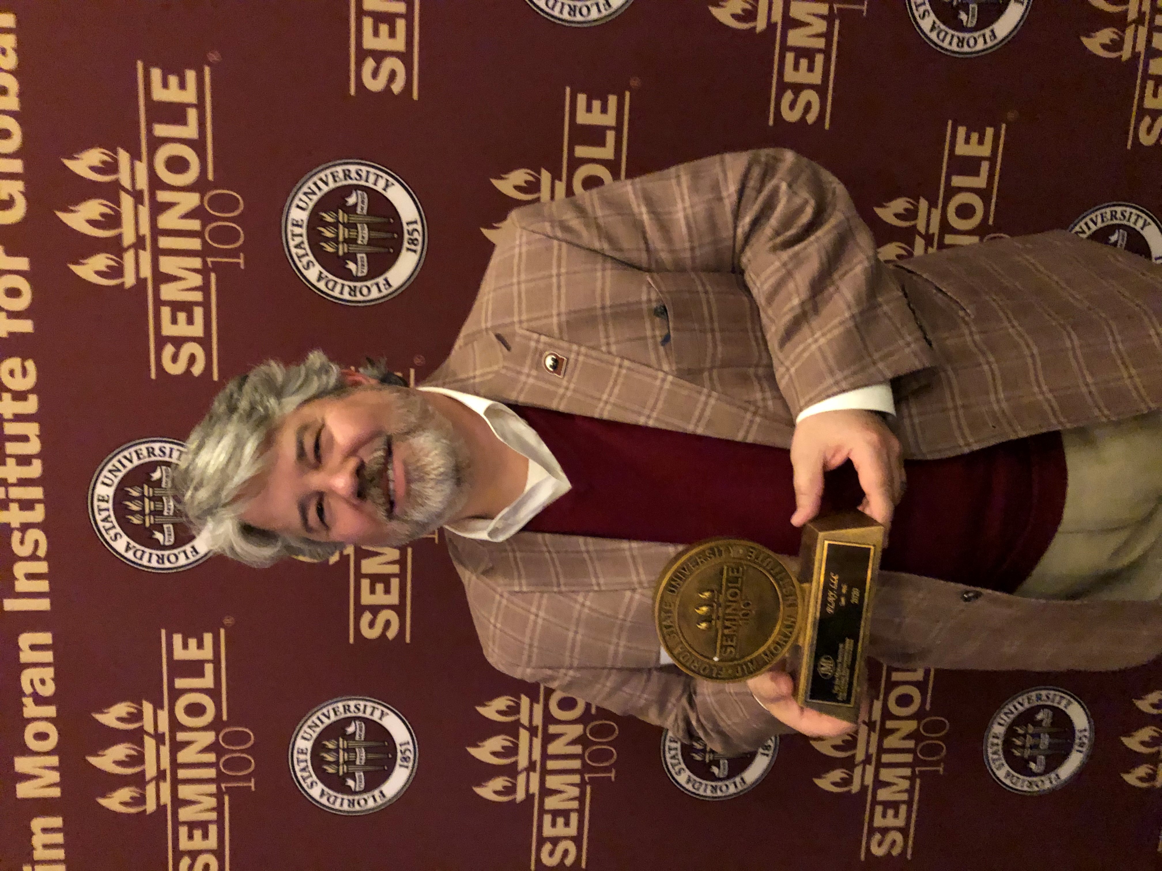Brett Player, CEO of PLAY, receives the Seminole 100 award in the 2020 ceremony.