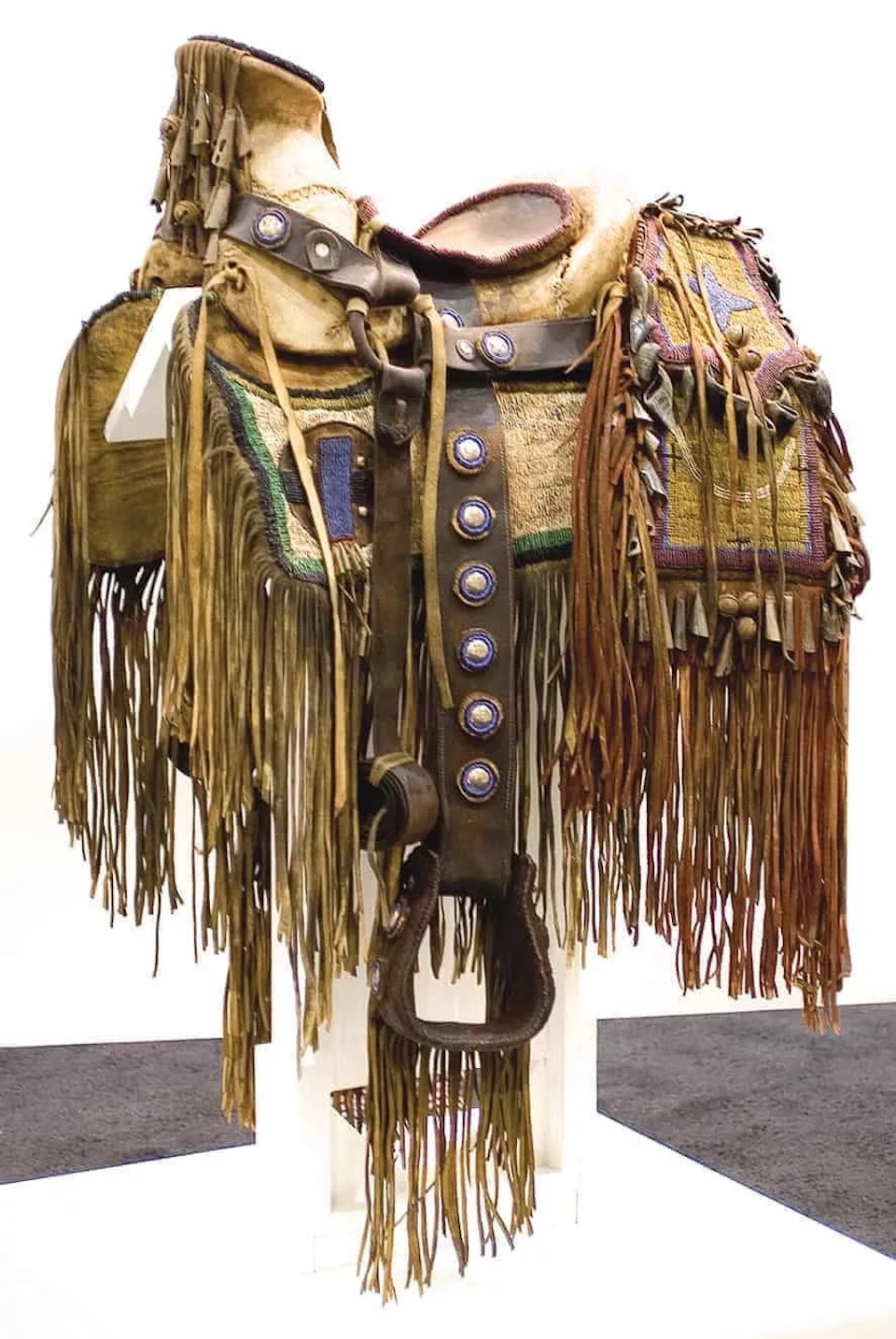 Painstakingly handcrafted works like this juried saddle entry from Many Tears can be found at the Western Design Conference Exhibit + Sale this September 9-12, 2021.