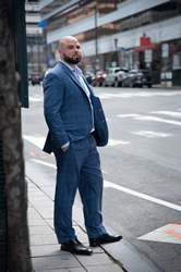 Shawn Lehocky, the new CEO of Pond Lehocky Giordano, LLP, stands on Market St in Philadelphia