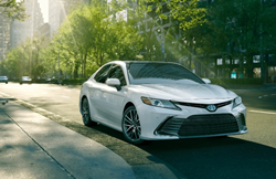 2021 Toyota Camry color white parked on the street