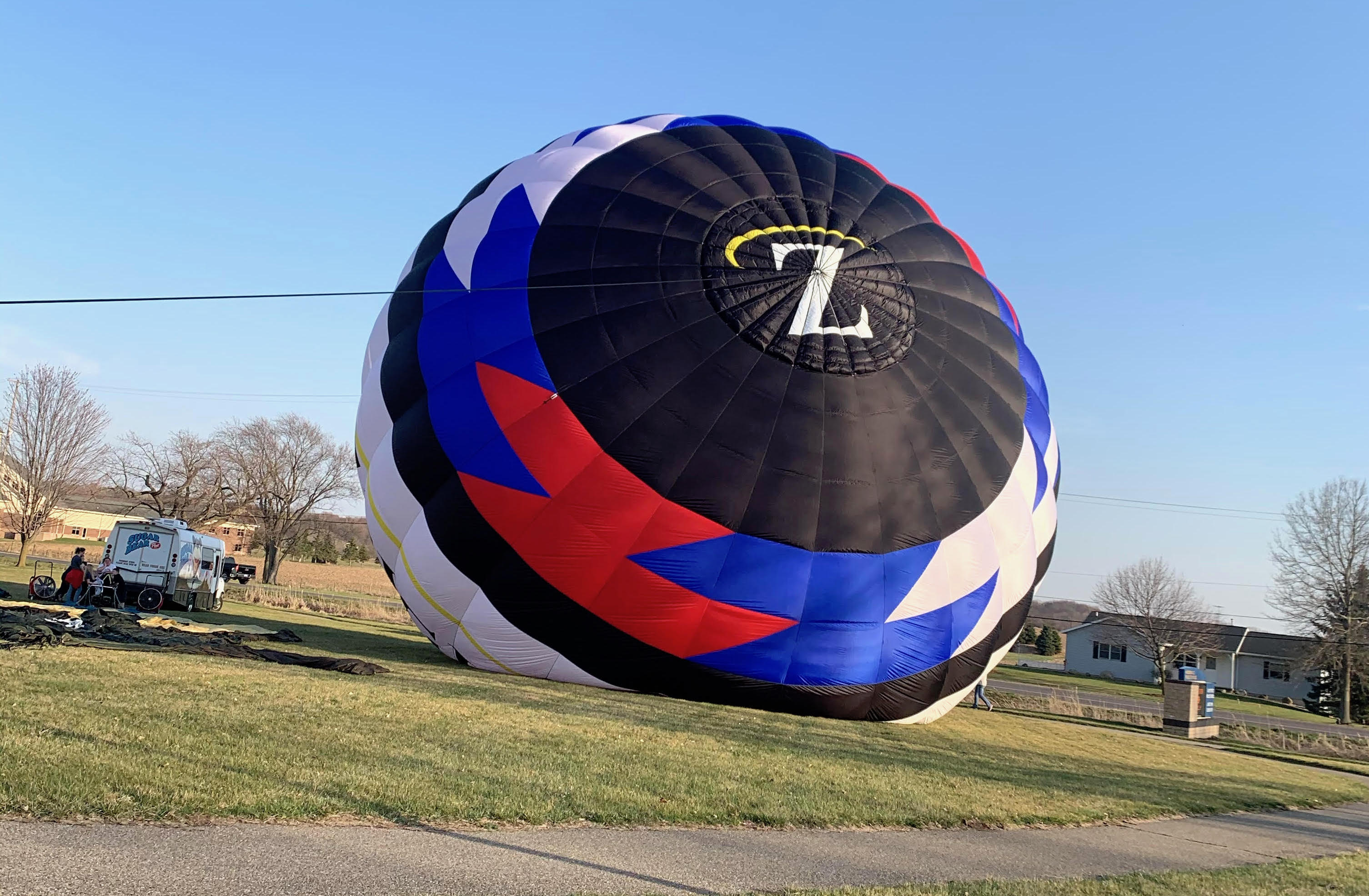 Zeigler Auto Group's Hot Air Balloon Touching Down After Easter Flight