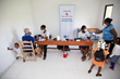 Families attend a Qatar Haiti Fund-sponsored mobile clinic at a Hope for Haiti partner community in southern Haiti. Photo copyright: Hope for Haiti.