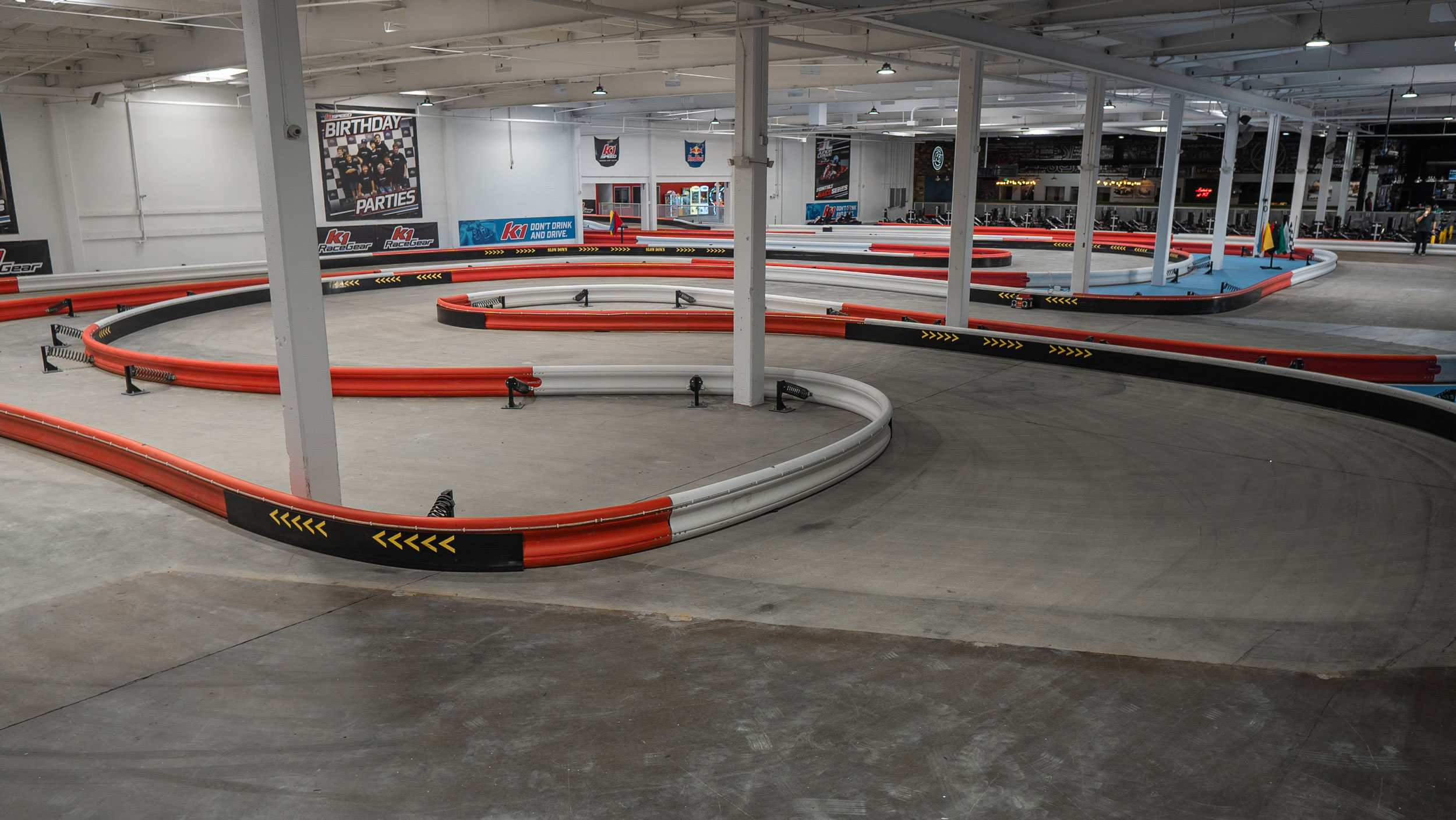 The indoor go kart track at K1 Speed Burbank is professionally designed for both amateurs and pros and features the safest barriers in the business.