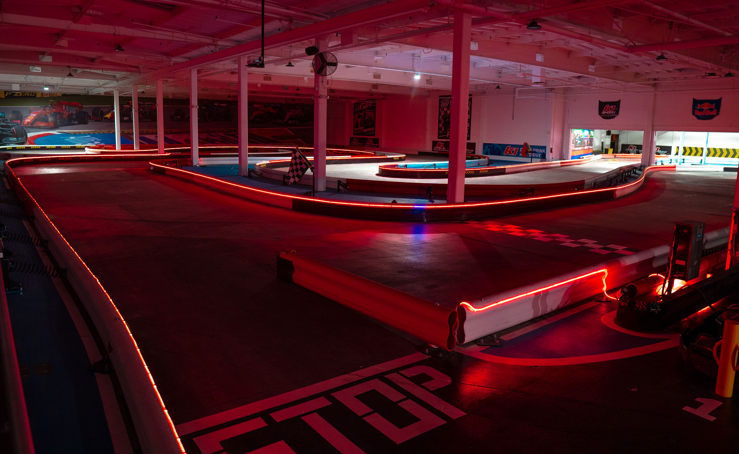 The LED-illuminated track barriers inside K1 Speed Burbank transforms the traditional go kart racing experience into something new and exciting