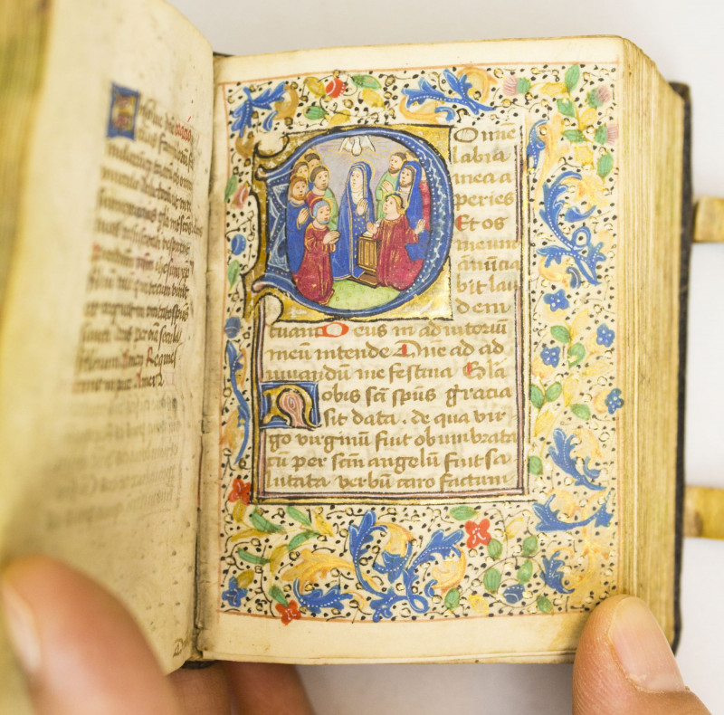 A MINIATURE ILLUMINATED MANUSCRIPT BOOK OF HOURS ON VELLUM IN LATIN AND DUTCH, WITH 19 CHARMING HISTORIATED INITIALS