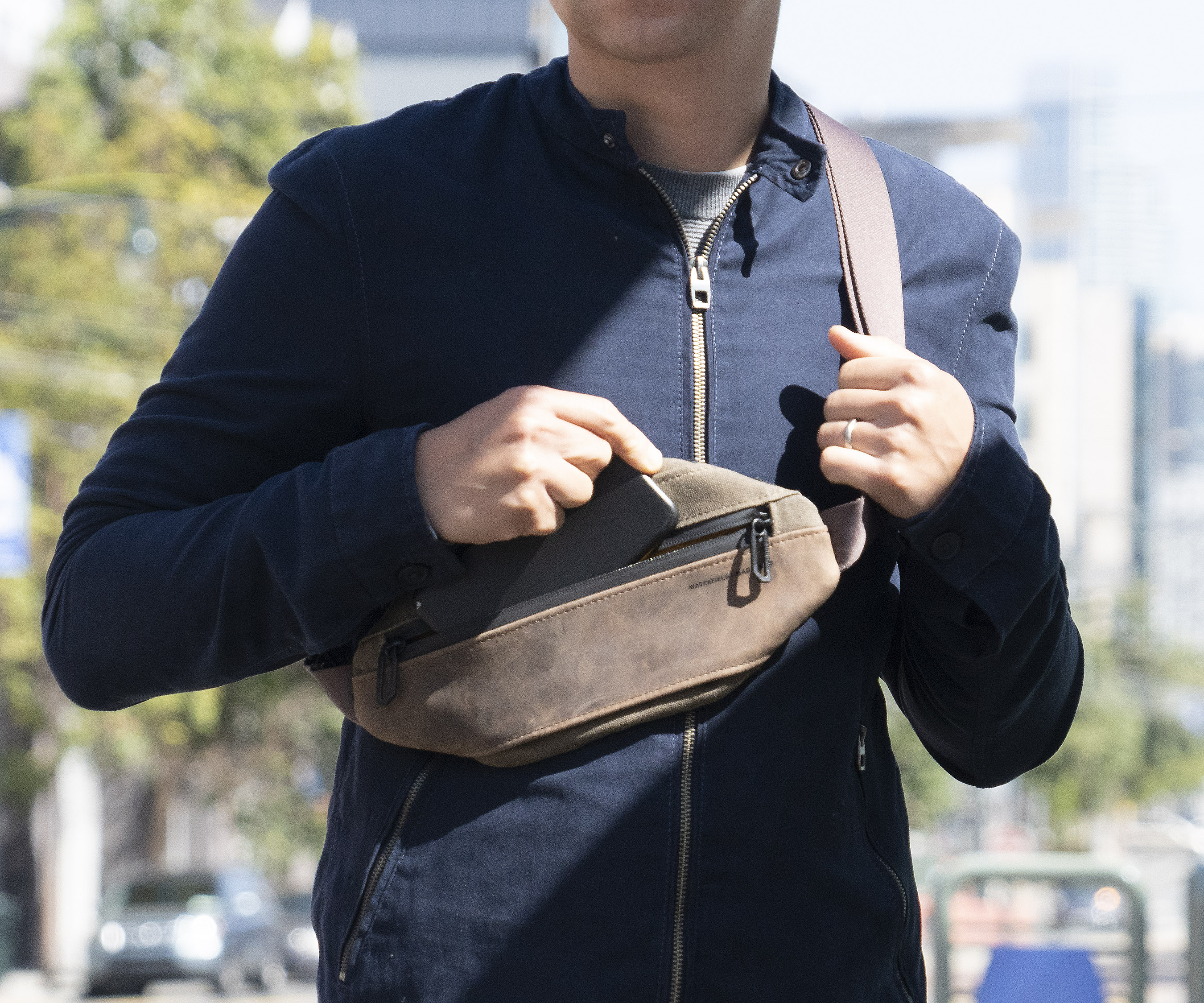 The Mini Hip Sling Bag in tan waxed canvas and chocolate full-grain leather
