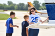 Volunteer EAA-member pilots donate their time and aircraft to provide free Young Eagles flights to kids age 8-17. The experience includes preflight review of how an airplane works. (EAA photo)