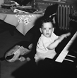 Bob as a child at the piano