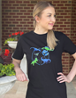 The new "Dinos in Space" fashion collection from Svaha & NASA astronaut Karen Nyberg includes adult & children's dresses, fashion tops & tees that glow-in-the-dark!