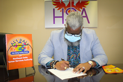 Northeast Delta Human Services Authority Executive Director Dr. Monteic A. Sizer signs the agreement with Delta Head Start to facilitate the provision of Al’s Pals: Kids Making Healthy Choices.