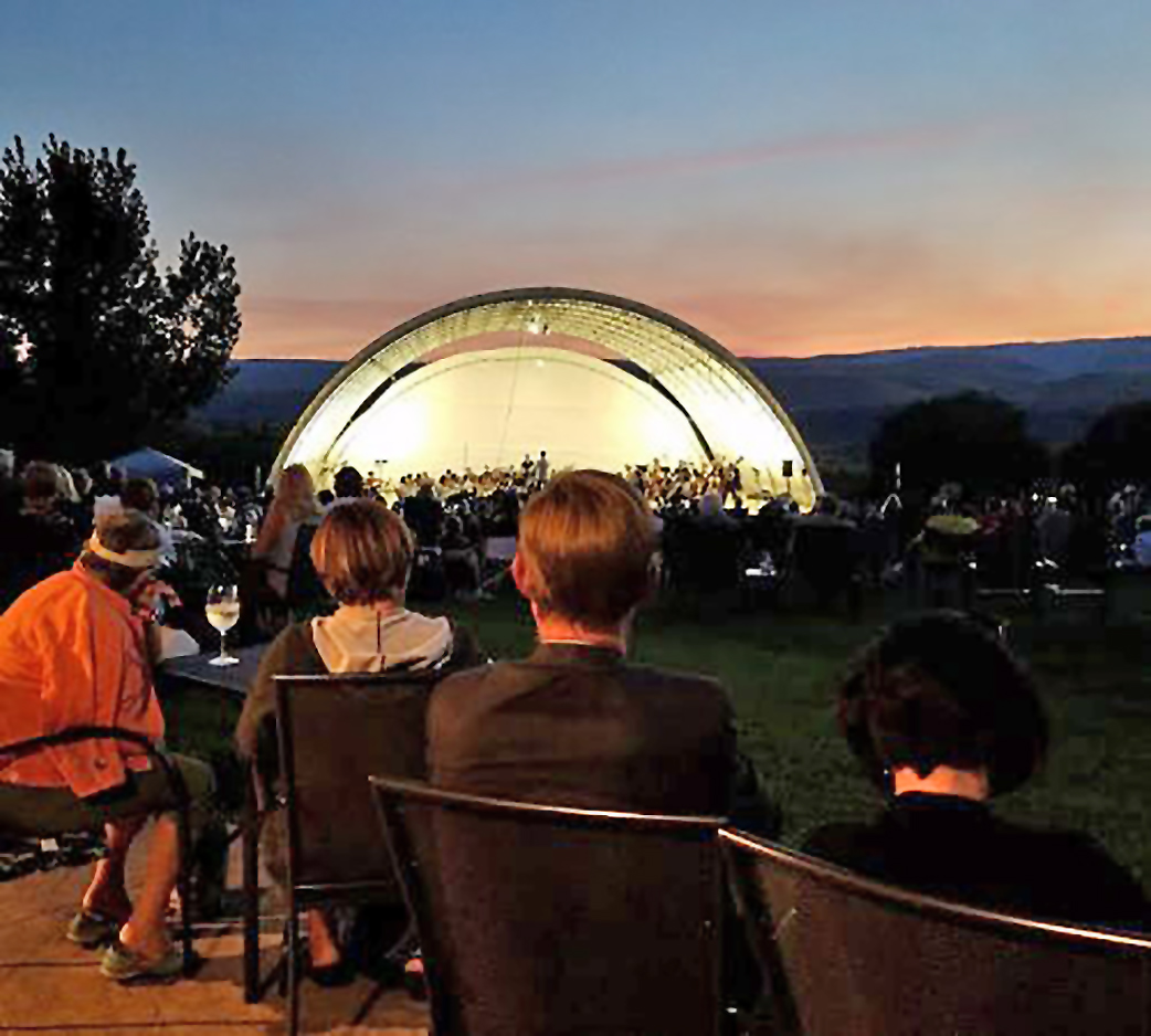 Enjoy stunning scenery and live theatre on Stage B at Cave B Estate Winery.
