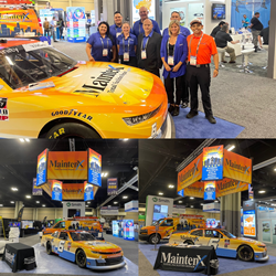 The MaintenX team with Ryan Vargas, and Vargas's #6 car in the exhibition hall
