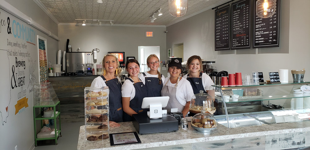 Owner Rachel Gray and her team inside Cornerstone Coffee House - Norris City, Illinois
