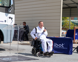 US Navy Veteran Ilya Poluektov giving remarks during the donation ceremony of an iBOT Personal Mobility Device.