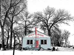 Cover art for the Mystic Braves' single, "Velvet Dreams" includes a house with a snowy background.
