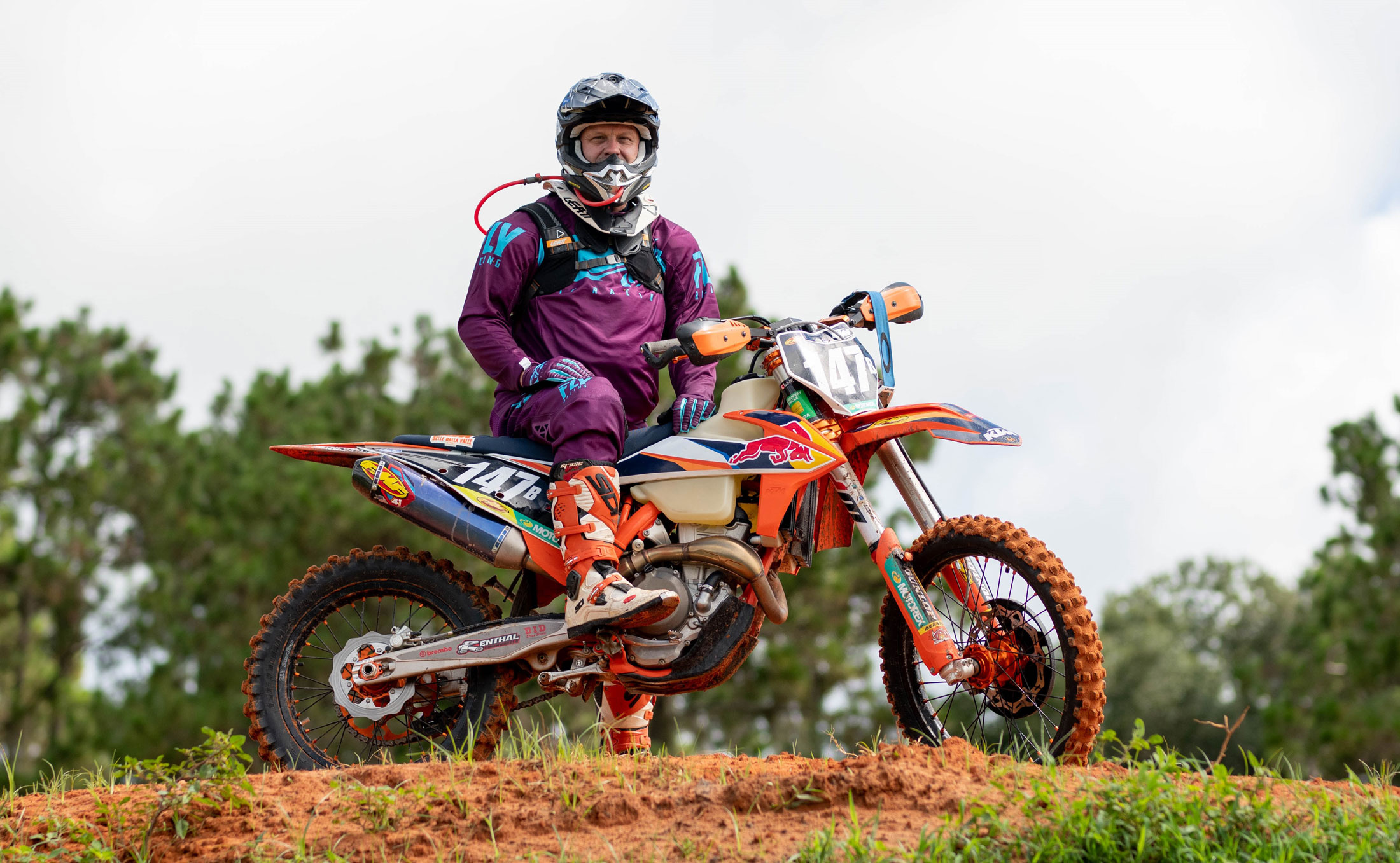 Dr. Randy K. Avent, president of Florida Polytechnic University, rides his KTM 350 dirt bike in Mulberry, Florida. Avent regularly competes in races throughout the state.