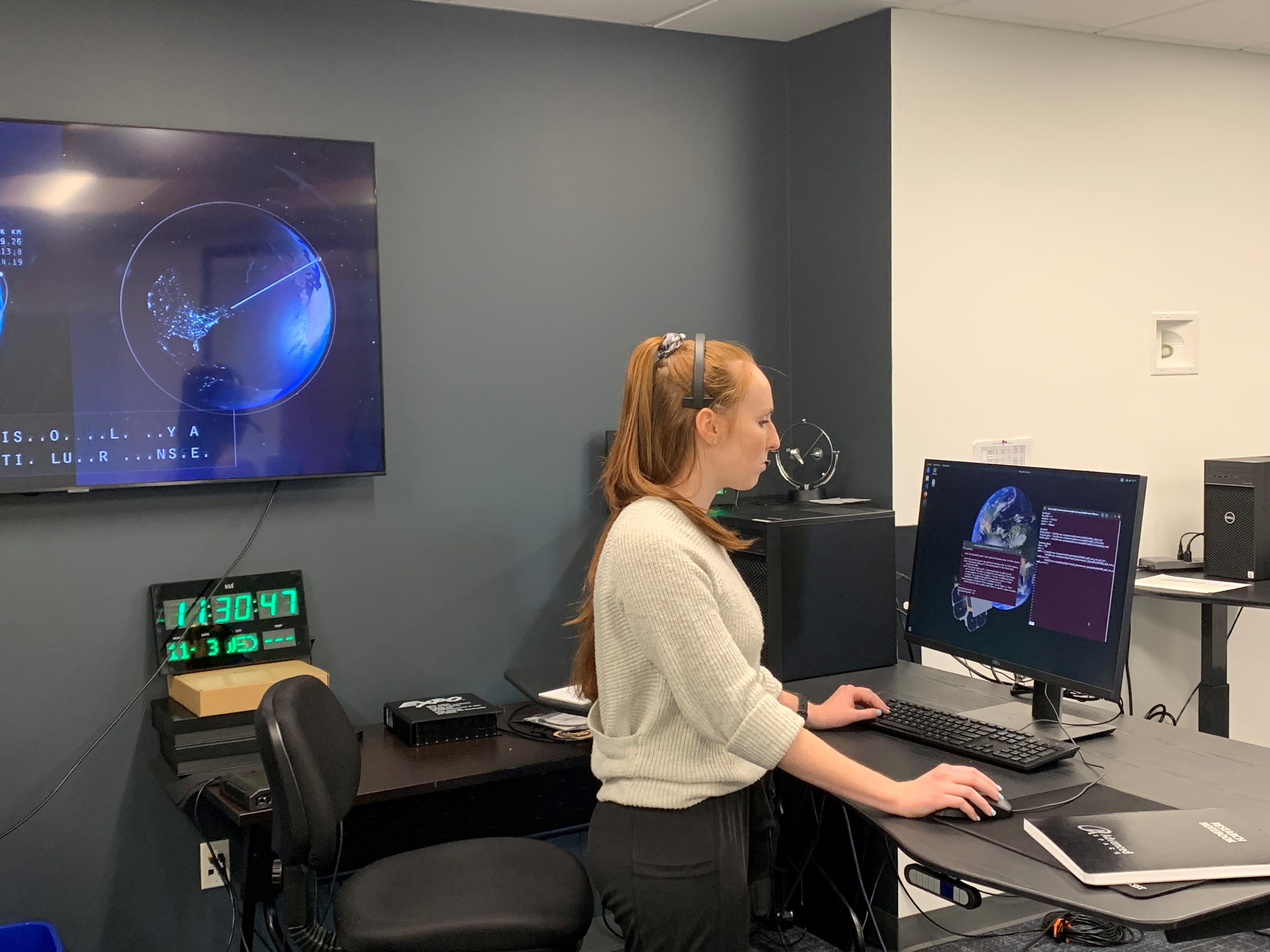 Advanced Space Astrodynamics and Mission Design Engineer, Lauren De Moudt, works on the flight operations simulation as part of the CAPSTONE mission Operation Readiness Test (ORT) in the new Advanced