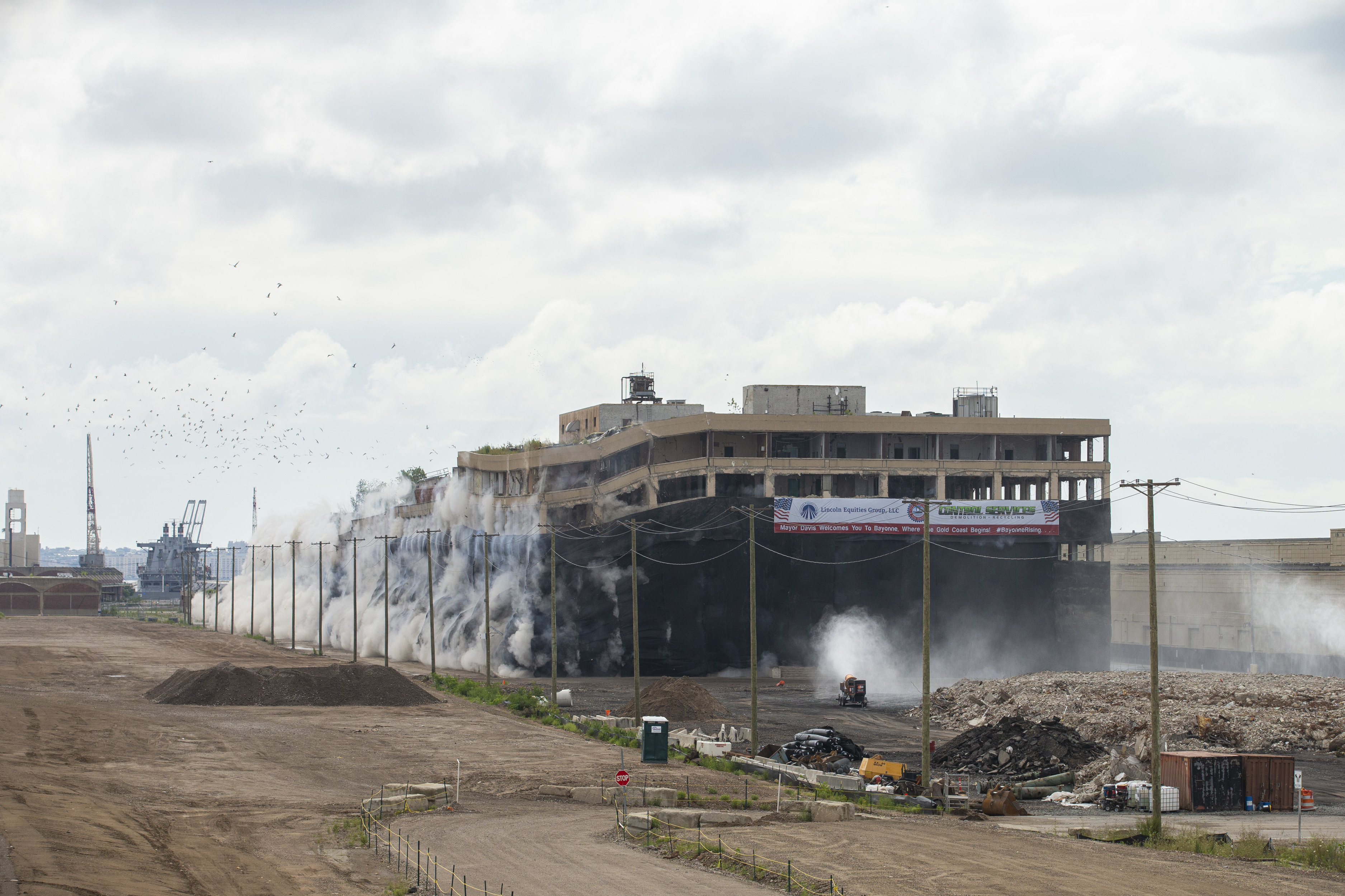 This is the second of two implosions at the site: in 2018, a demolition crew imploded a 175-foot smokestack and a 150-foot steel water tower. Photo courtesy of Jin Lee, for LEG.