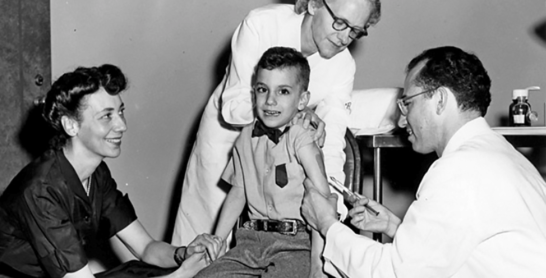 In 1955, Dr. Jonas Salk is administering the polio vaccine he invented into his son’s arm, ending a very dark time in the world. Courtesy of Darrell Salk.