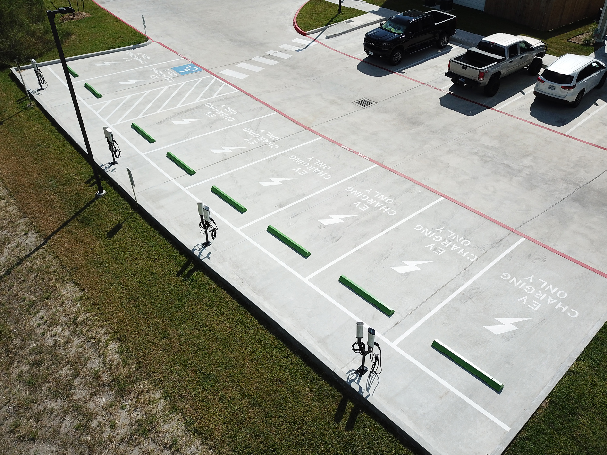 The eight SemaConnect Series 6 charging stations are mounted on four dual pedestals conveniently located near the back of the community’s shared parking.