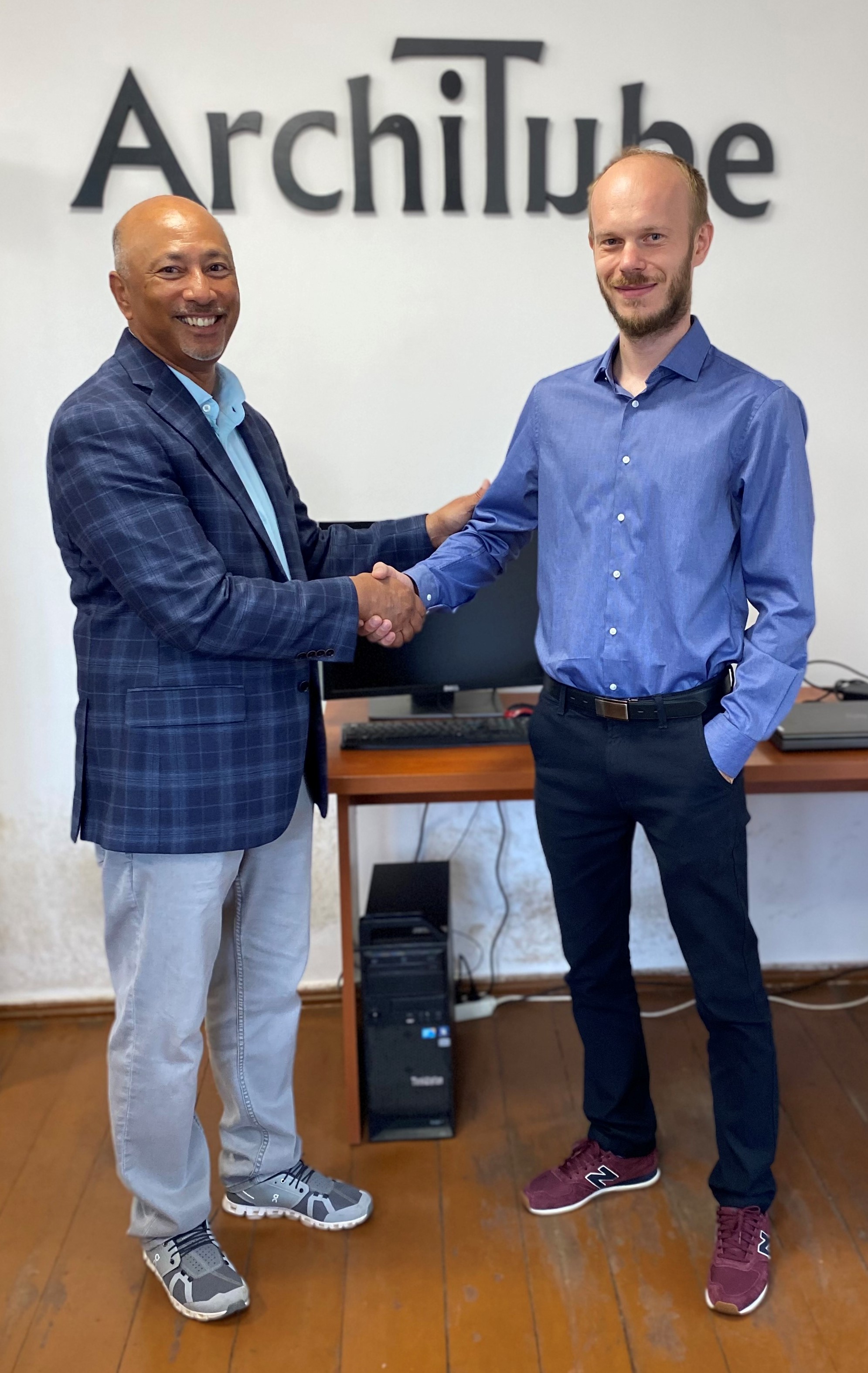 L to R: President Bony Dawood, PE, welcomes ArchiTube's Adam Grewenda to the Dawood family of companies.