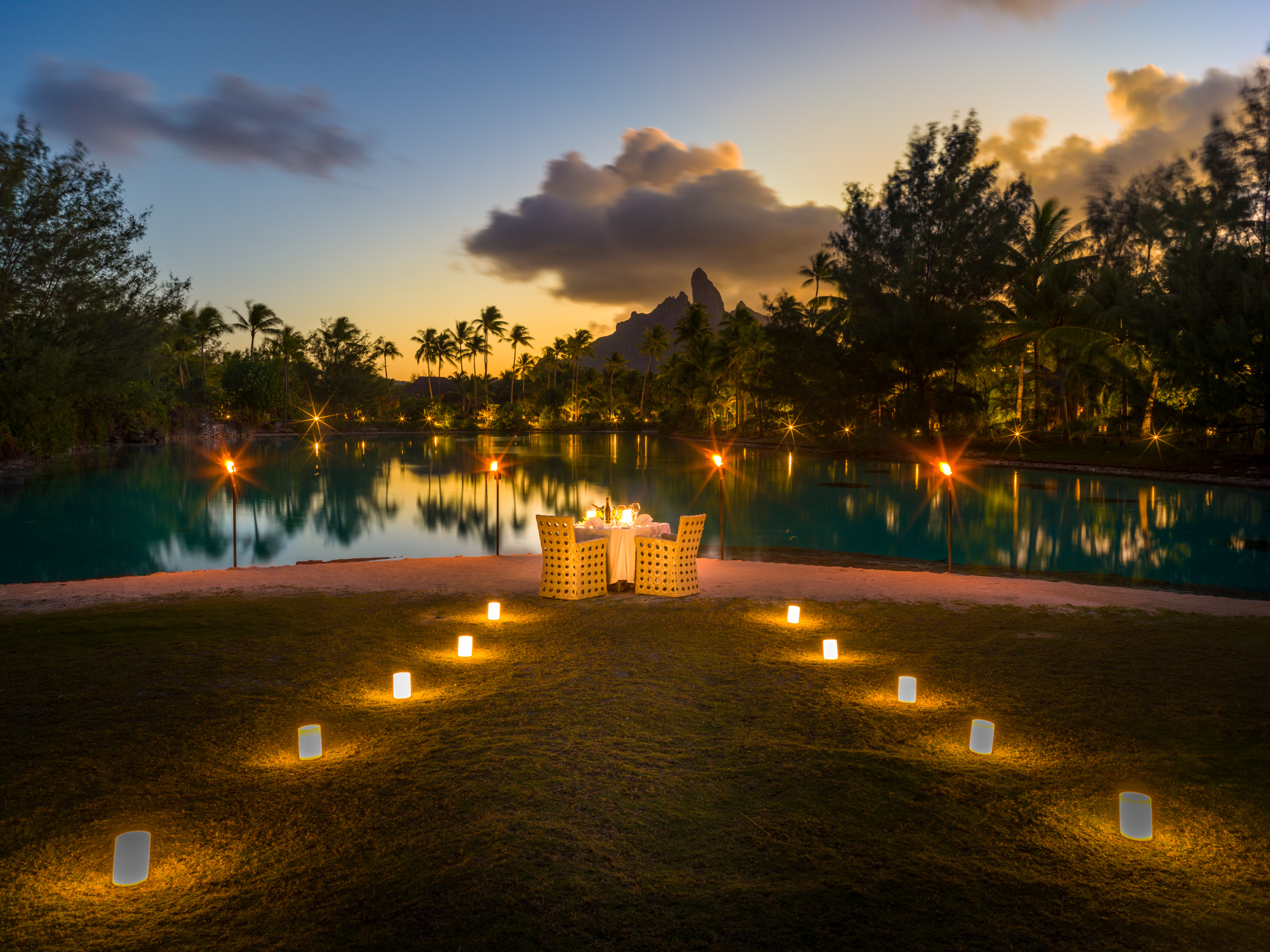 Candlelight dinner on a private island in the resort's Lagoonarium.