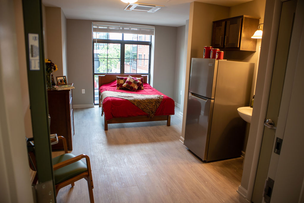 A single room occupancy unit at SOME's Anna Cooper House, serving residents at 0-30% of family median income (FMI).