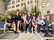 From left, SupplyHive™ President and CEO Lou Sandoval, in pink shirt, and SupplyHive™ Founder Mike Anguiano, in black shirt, share a relaxing moment with their team in Chicago.