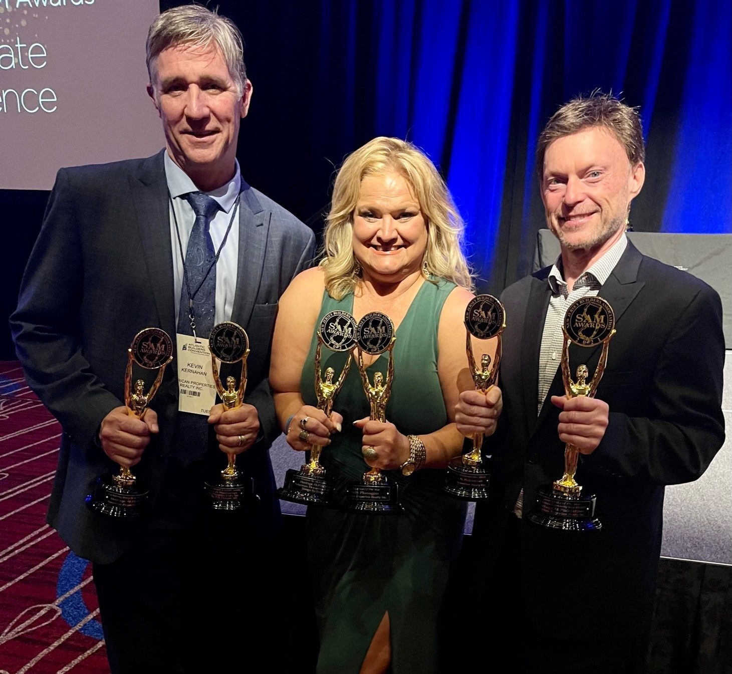 Celebrating their win for Heritage at Middletown is Kevin Kernahan, SVP, Kelly Flanagan, Sales Manager and Paul Csik, SVP, all of American Properties Realty, Inc.,