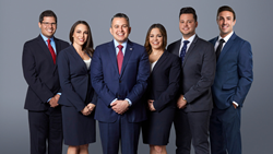 The staff of Di Pietro Partners including probate attorney David Di Pietro in the middle in a navy blue suit along with his litigation partners on the right and left