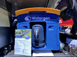 The vehicle features a selection of adventure accessories and gear, including an Atmospheric Water Extraction System from WaterGen.