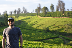Crimson Cup's Brandon Bir on a tea farm.
