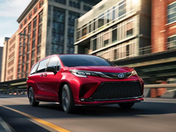 2022 Toyota Sienna Red driving on the road