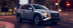 2022 Hyundai Tucson Gray driving on the road