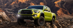 Front view of a 2022 Toyota Tacoma TRD Pro on a off-roading track