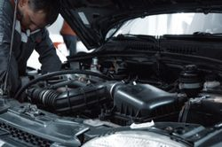 Service professional working on a car