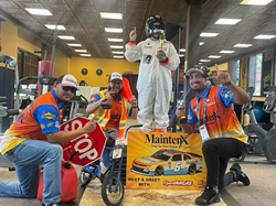 The winning team in the 2021 Costume Contest dressed as Ryan Vargas and his pit crew