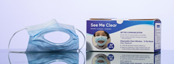 A single See Me Clear™ mask sitting next to a fresh box of mask