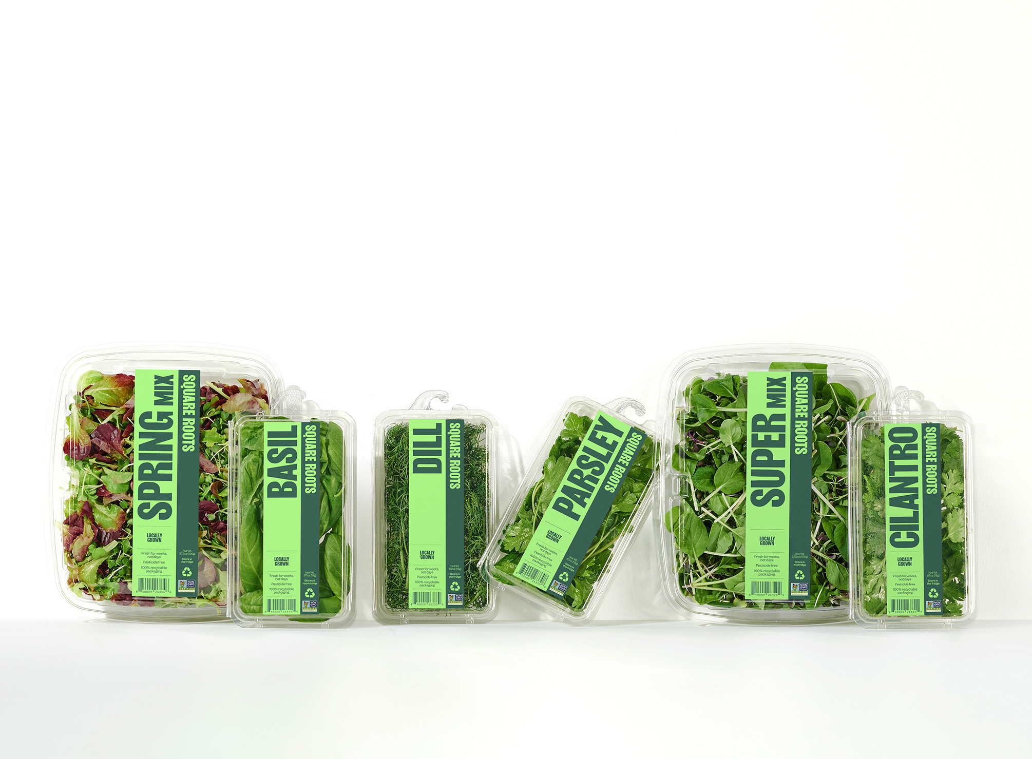 The newly designed packaging from Square Roots is featured on the company's herbs and salad mixes.