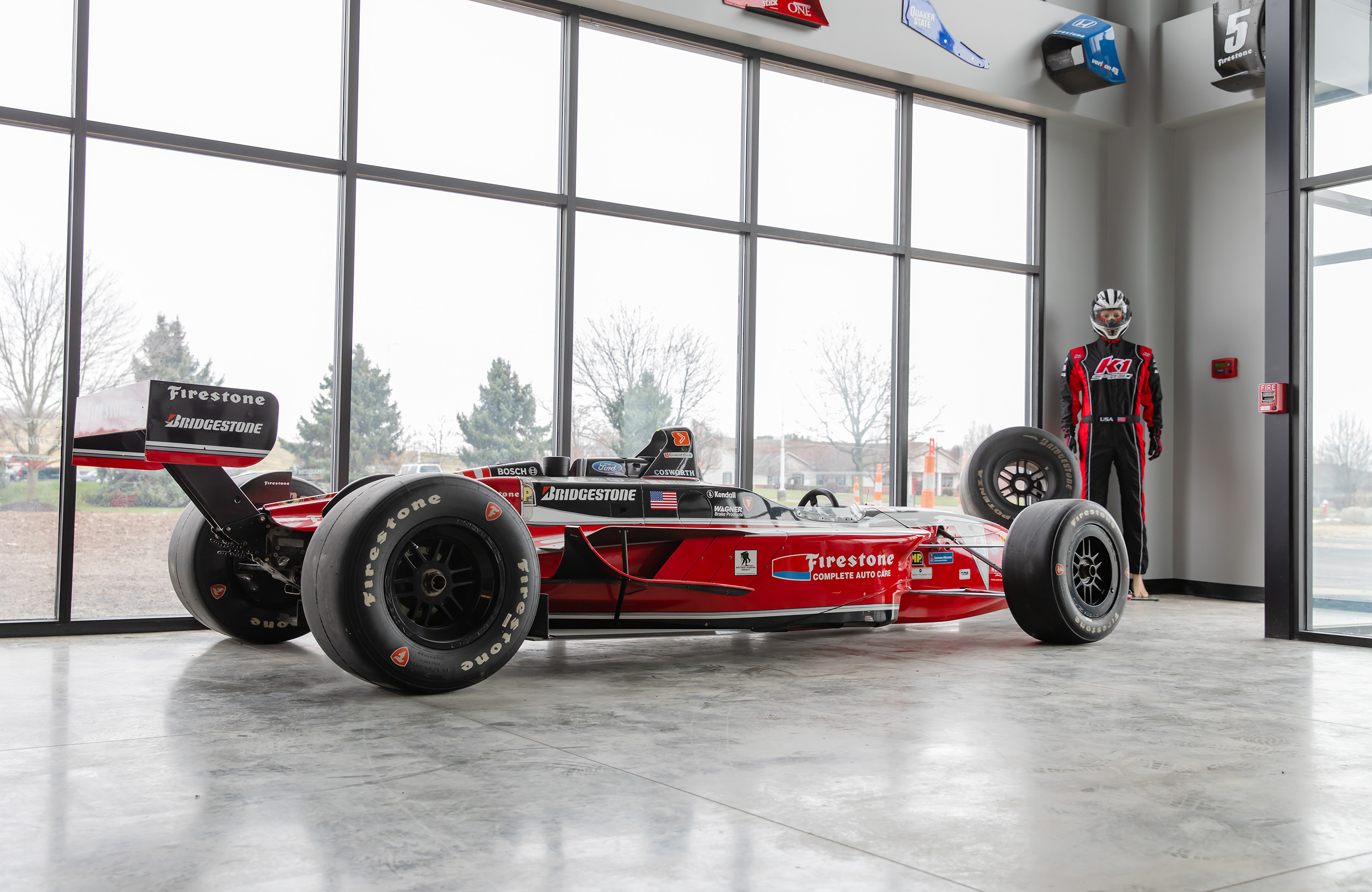 An authentic Champ Car sits on display in the lobby at K1 Speed Canton