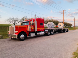 Odyssey Logistics Specialized Logistics Truck Hauling Oversized Metal Objects