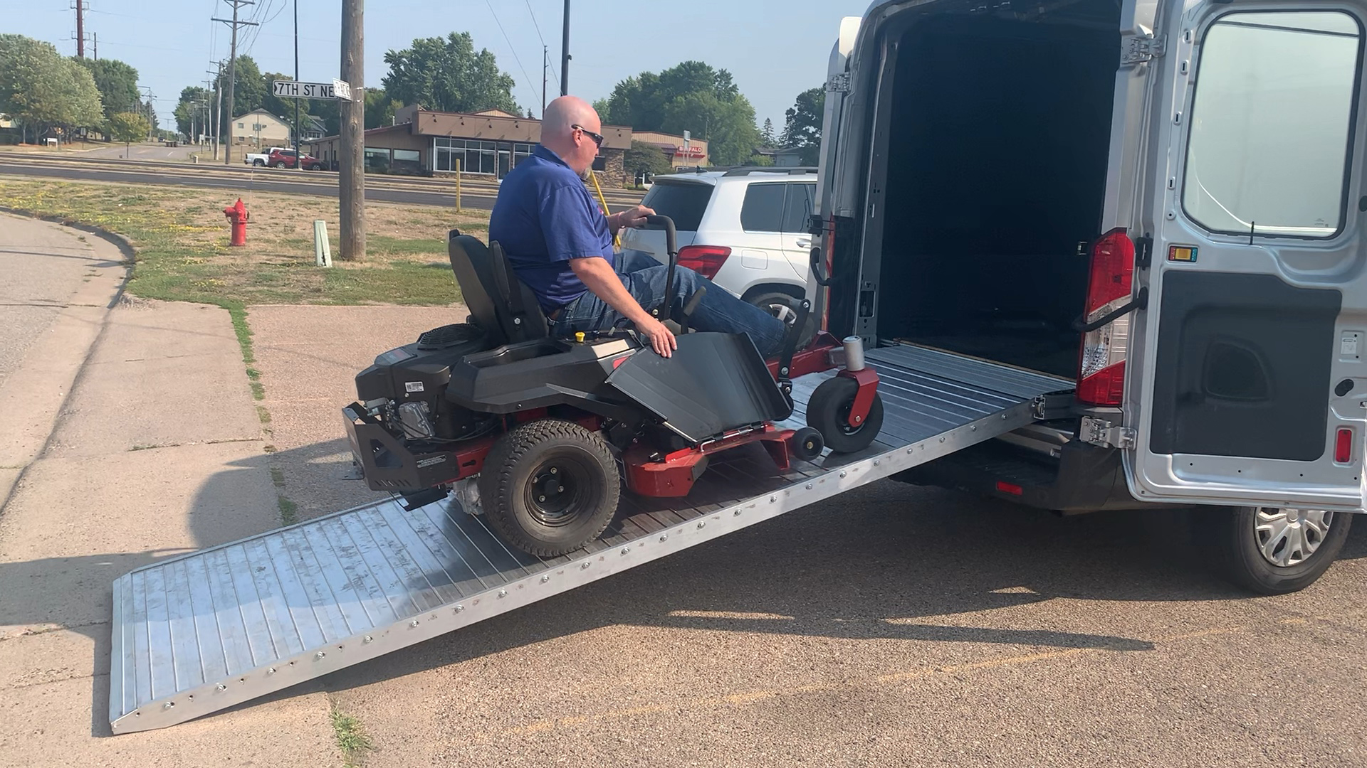 By eliminating the side rails, the Hide-A-Ramp’s design allows equipment, like mowers, to move up and down and, if necessary, extend over the edge of the ramp without getting hung up.