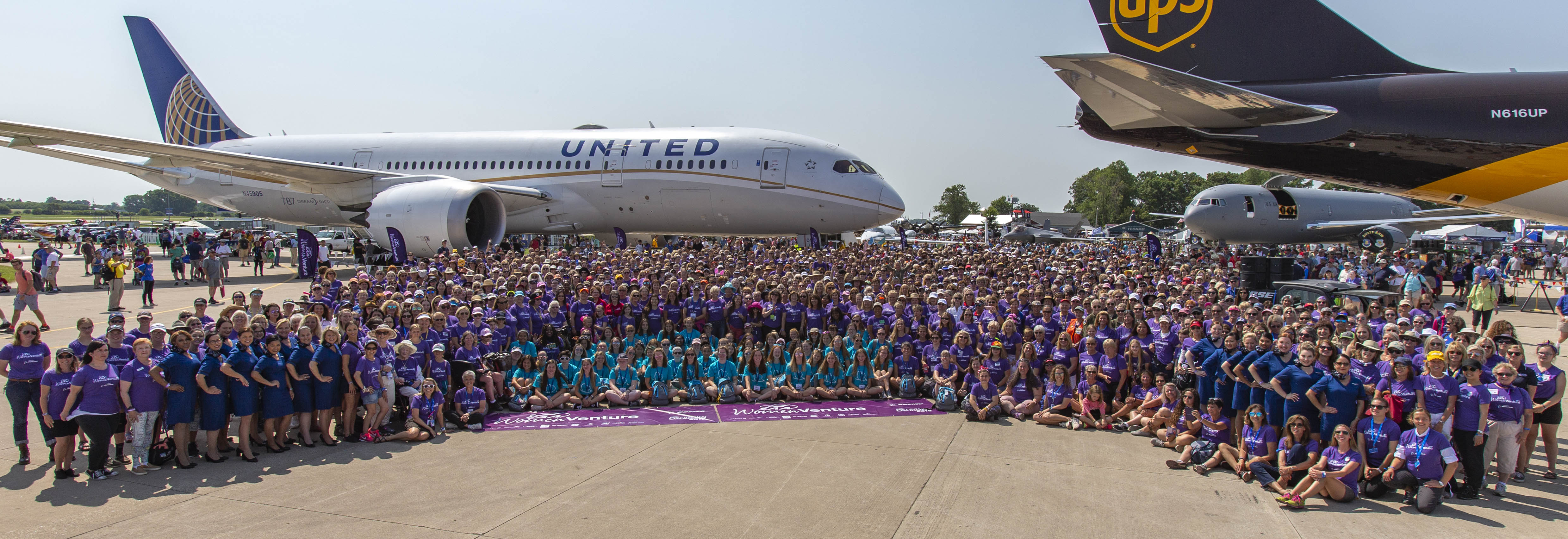 Hundreds of women aviators gather on Boeing Plaza for the annual group photo during WomenVenture activities at EAA AirVenture Oshkosh 2019. (EAA photo/Chris Miller)
