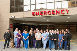 Mercy Emergency Department (ED) members gather on the ED deck to celebrate winning the 2022 All-Pro Nursing Team Award.