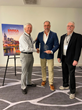 Ellis Hill (left) and Stan Romero (right) of ResearchFirst & BMMA present the Vendor Marketing Award to Naylor Gray of Calix at the BMMA 2022 Annual Meeting in Nashville, TN.